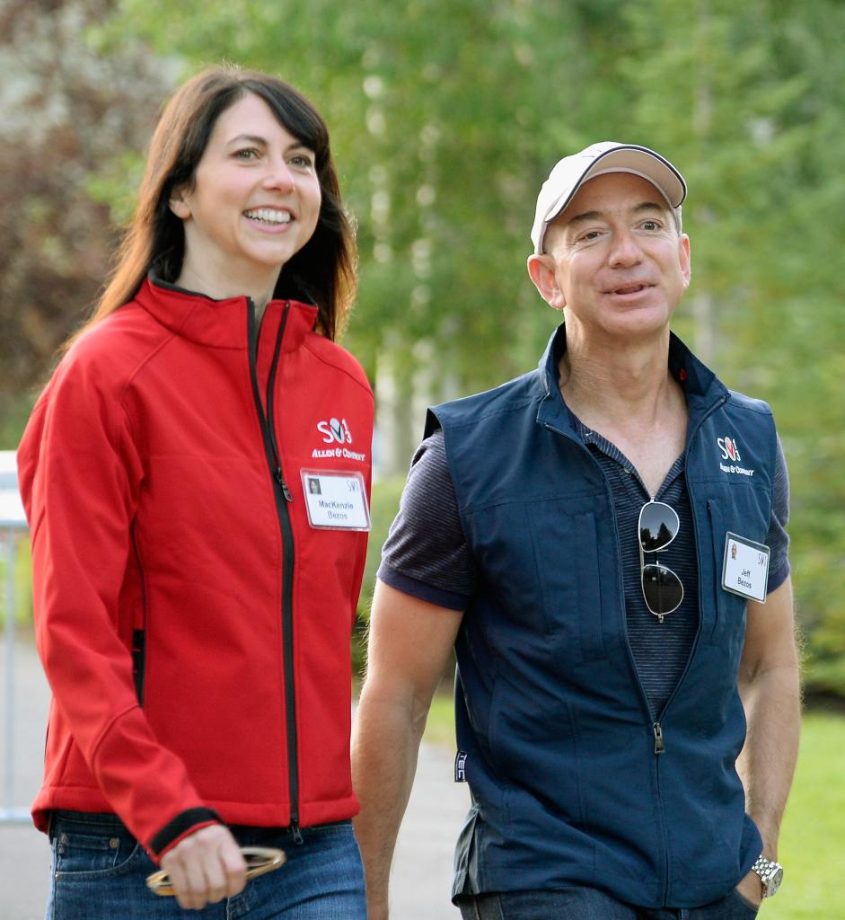 Jeff Bezos and Mackenzie Scott walking together outside.