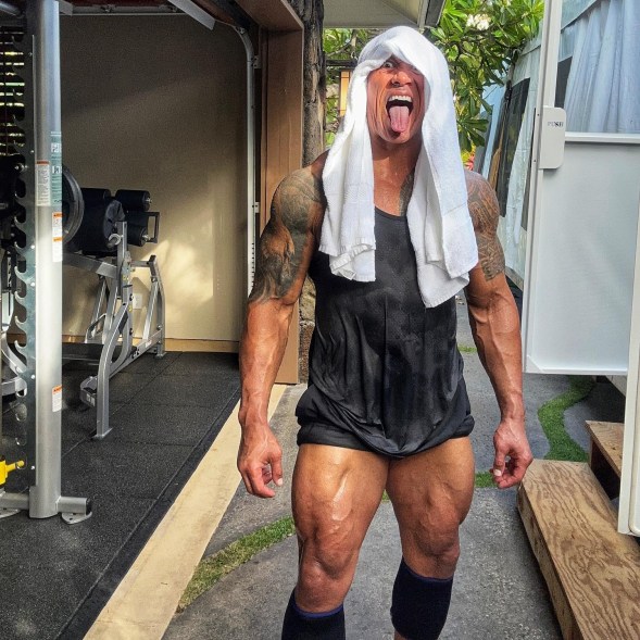 dwayne "the rock" johnson sweaty with a towel over his head