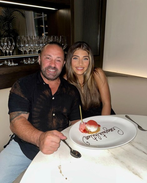 gia and joe giudice with a dessert