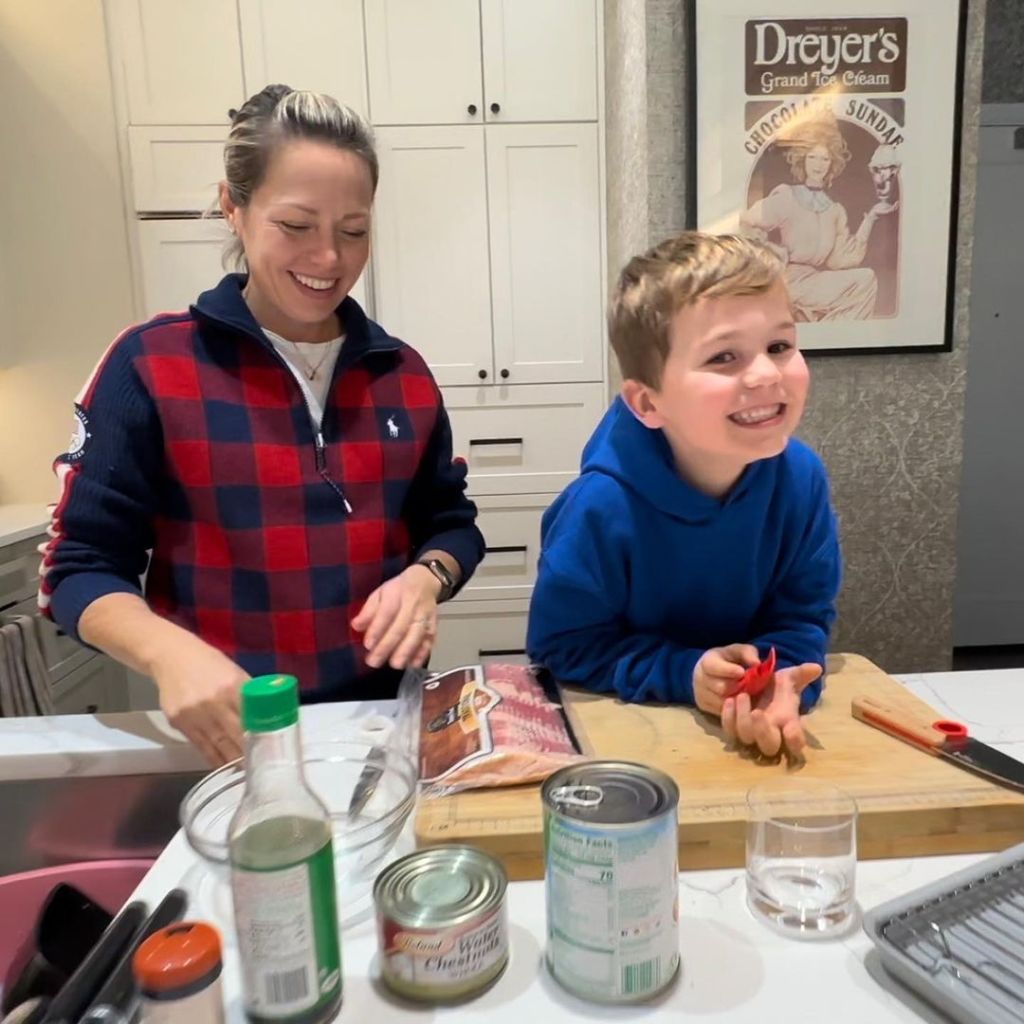 Dylan Dreyer and Calvin cooking. 