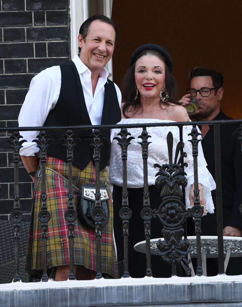 joan collins and husband percy gibson celebrating her birthday 