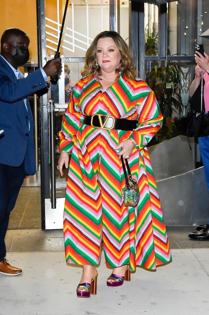 Melissa McCarthy posing in a dress.