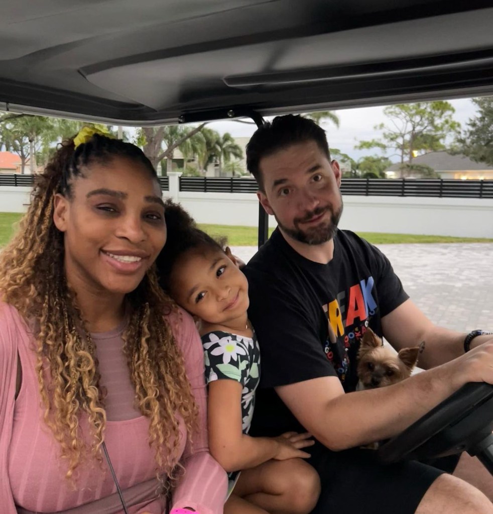 Alexis Ohanian and Serena Williams in a golf cart with daughter Olympia.