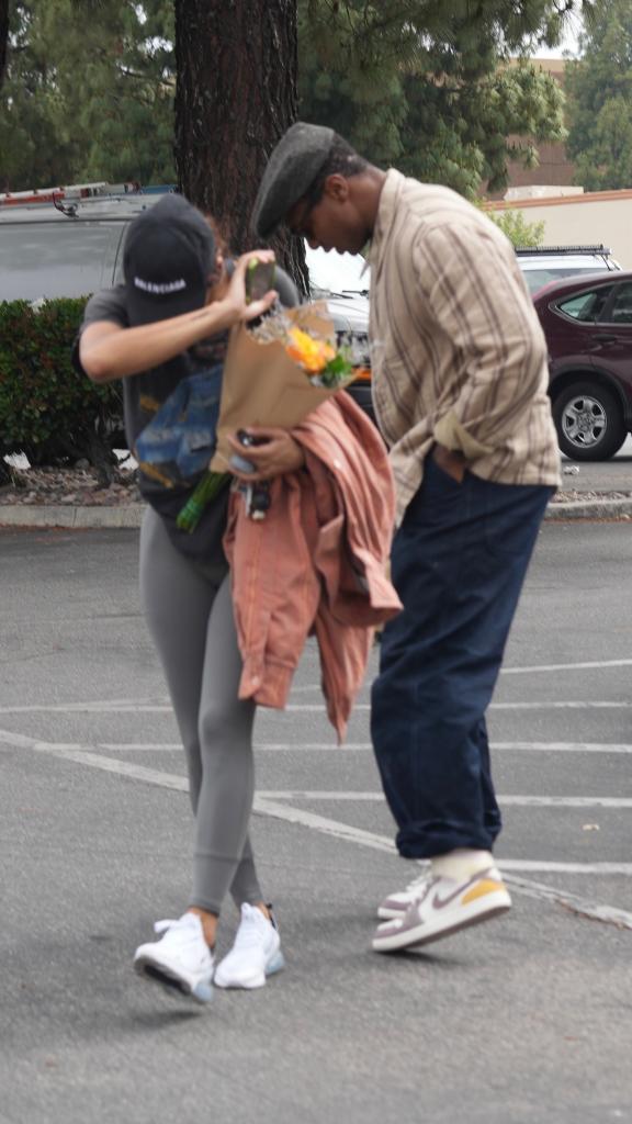 Jonathan Majors and Meagan Good leaving Red Lobster.