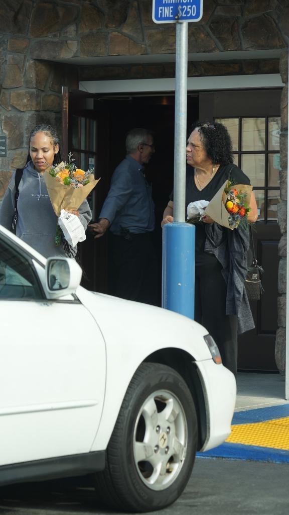 Meagan Good's mom and sister leaving Red Lobster.