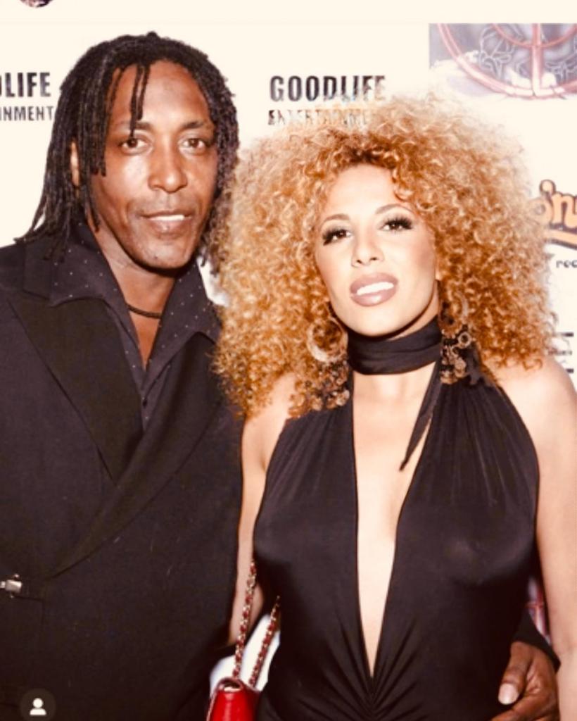 Ronnie posing with his wife Afida Turner.