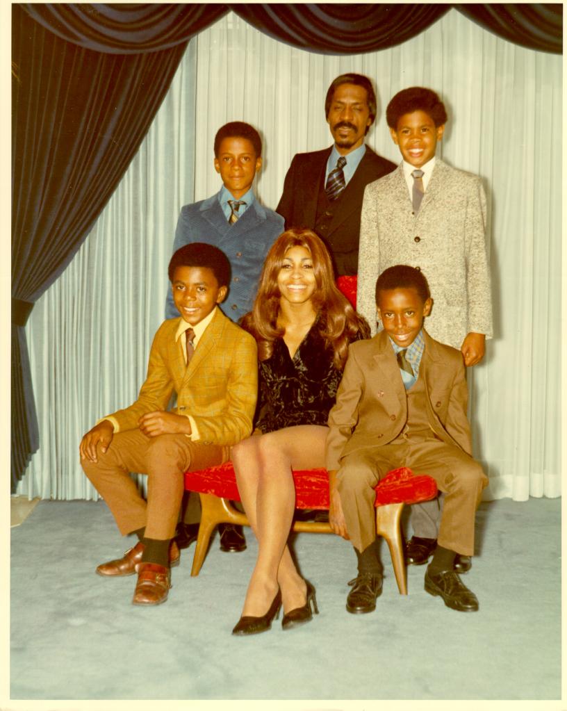 Tina and Ike Turner posing with their kids.