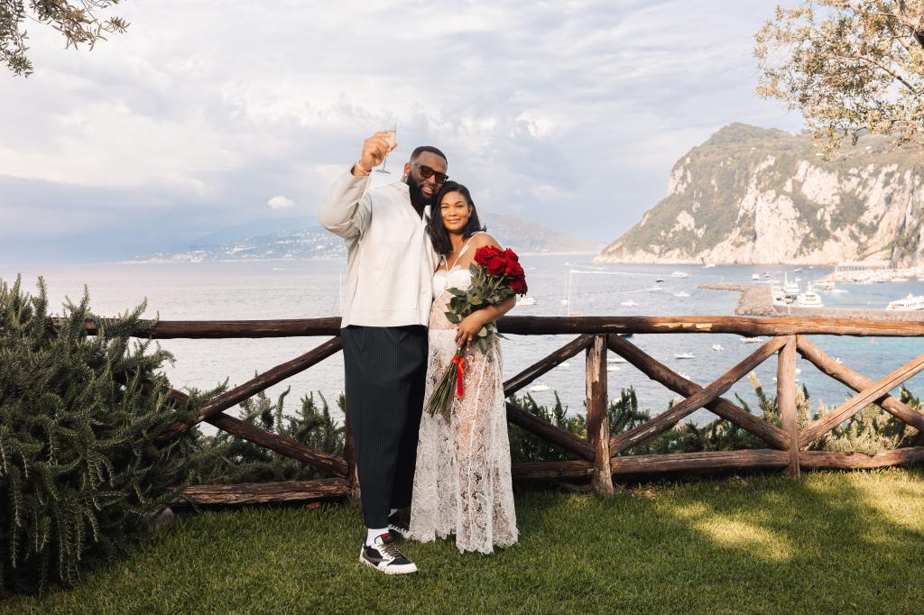 CHanel Iman holds flowers with Devan Godchaux