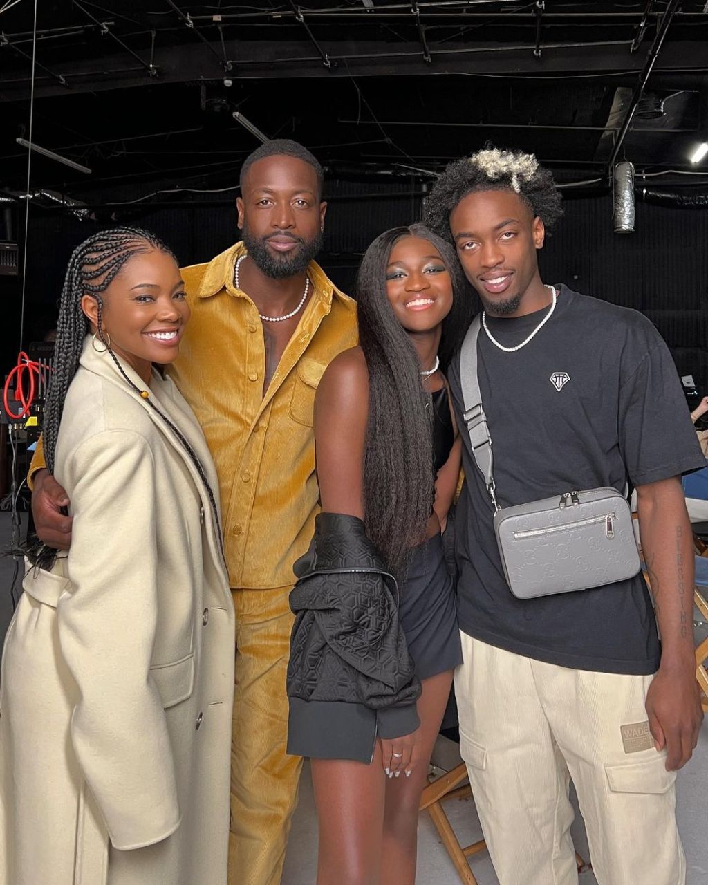 Dwyane Wade and Gabrielle Union pose with Zaya and Zaire