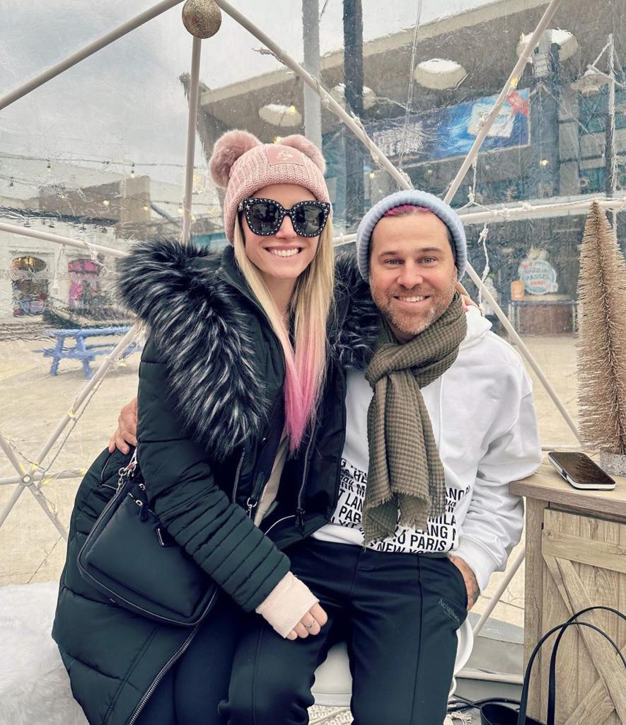 Alexa Bliss sits on Ryan Cabrera's lap