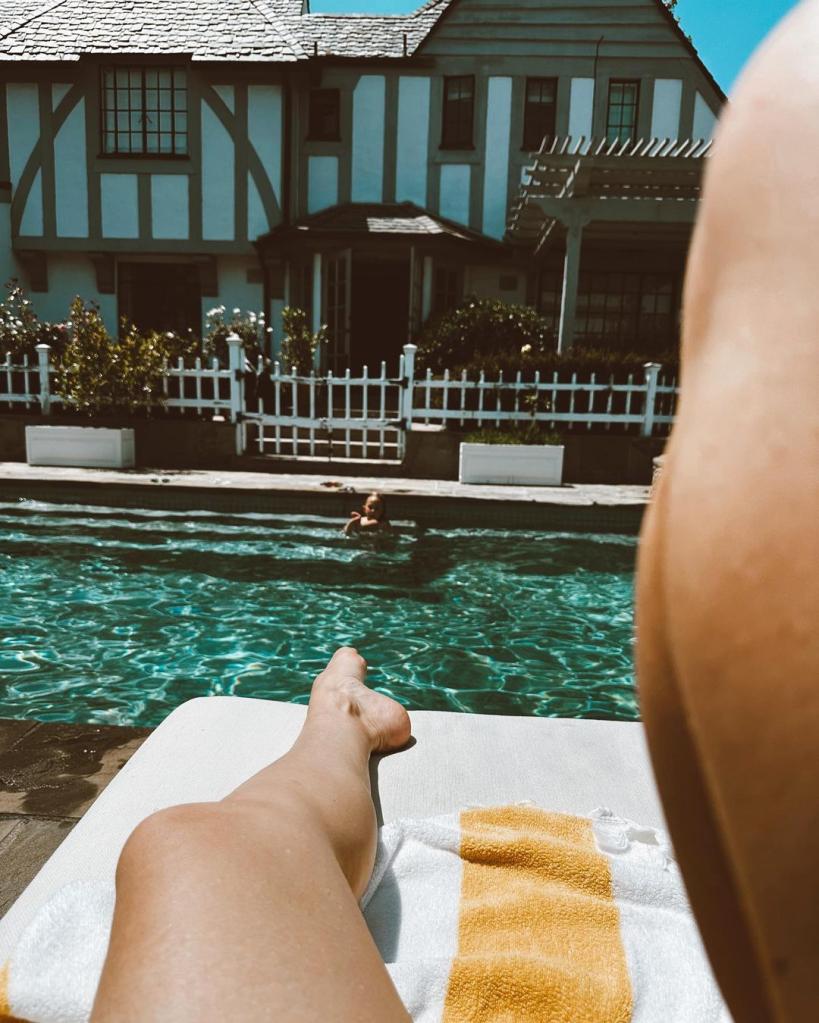 Kate Hudson by the pool.