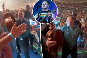 Zach Bryan kicked a fan out of his concert after she tried to take his guitar.