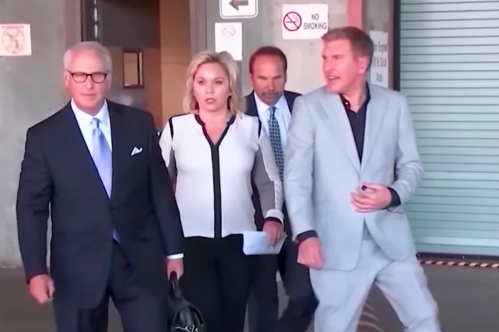 Julie Chrisley and Todd Chrisley leaving court.