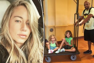 Kendra Wilkinson takes selfie, split with Hank Baskett posing with their two kids