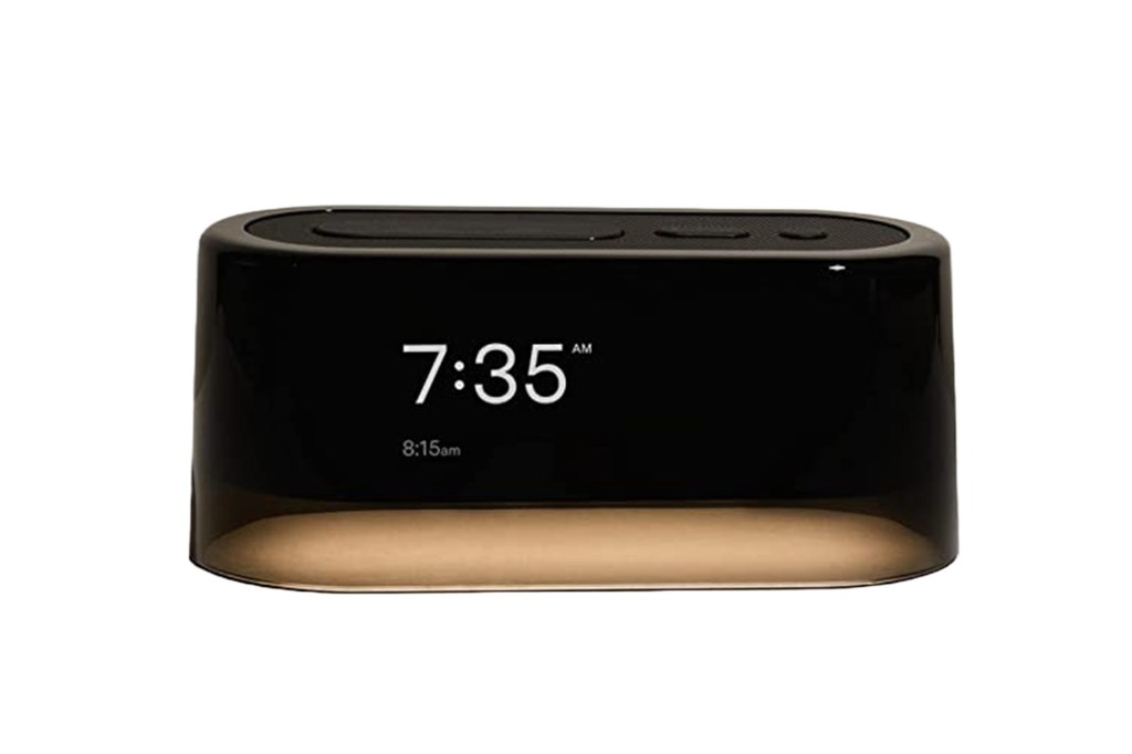 A black and gold Loftie alarm clock