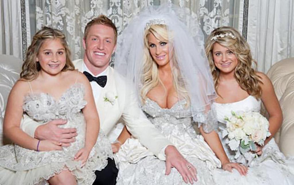 Kroy Biermann and Kim Zolciak on wedding day with Brielle and Ariana