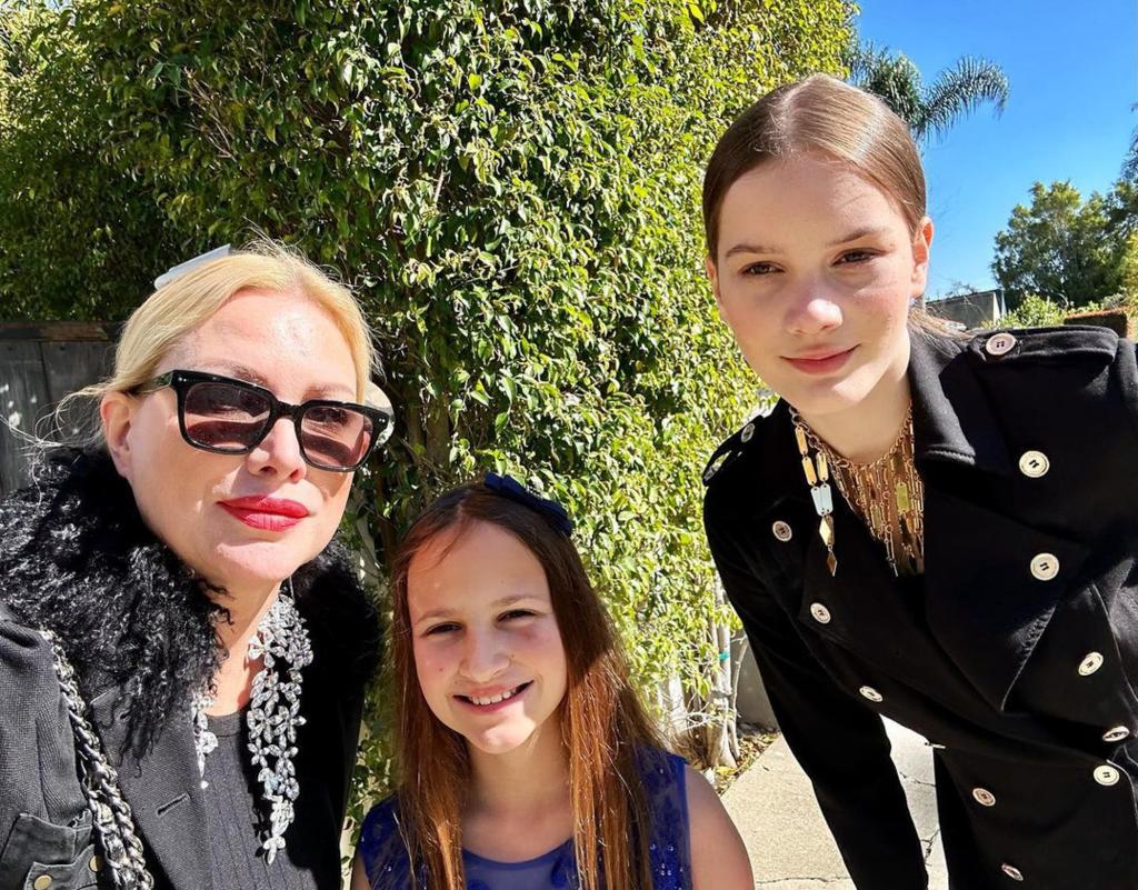 Alice Evans and her daughters. 