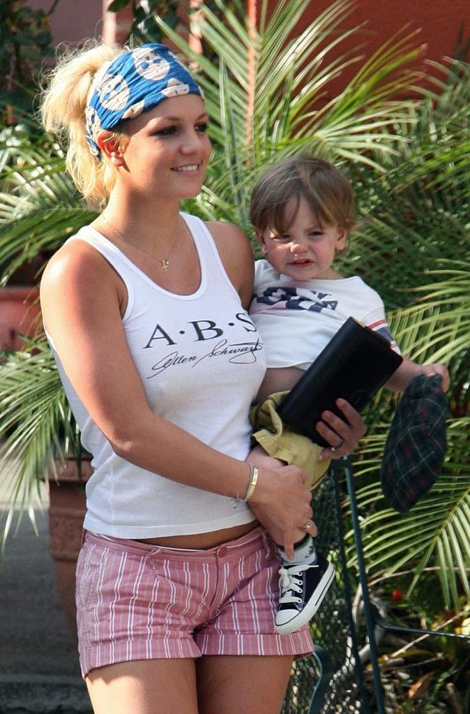 Britney Spears holding Sean Preston.