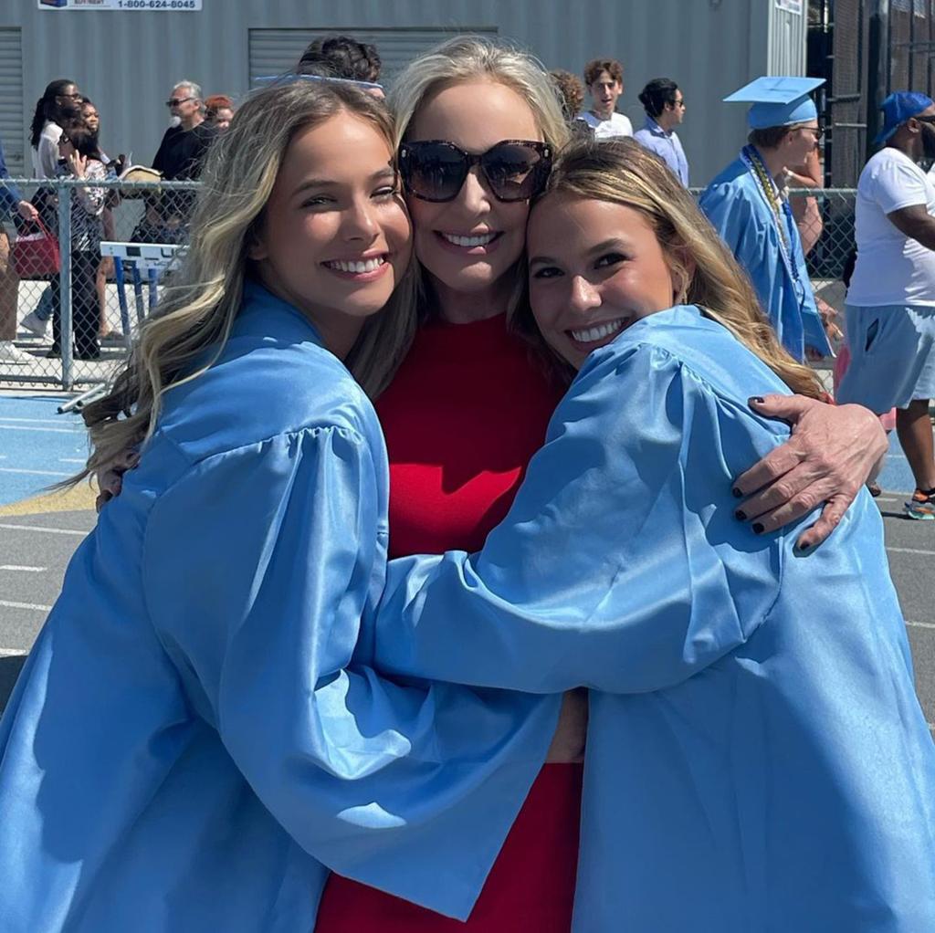 Shannon Beador hugs daughters Stella and Adeline at graduation