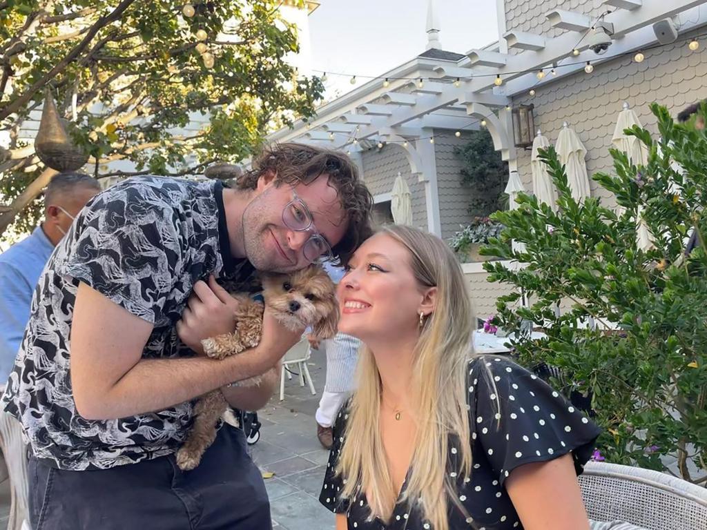 Treat Williams' kids hold dog