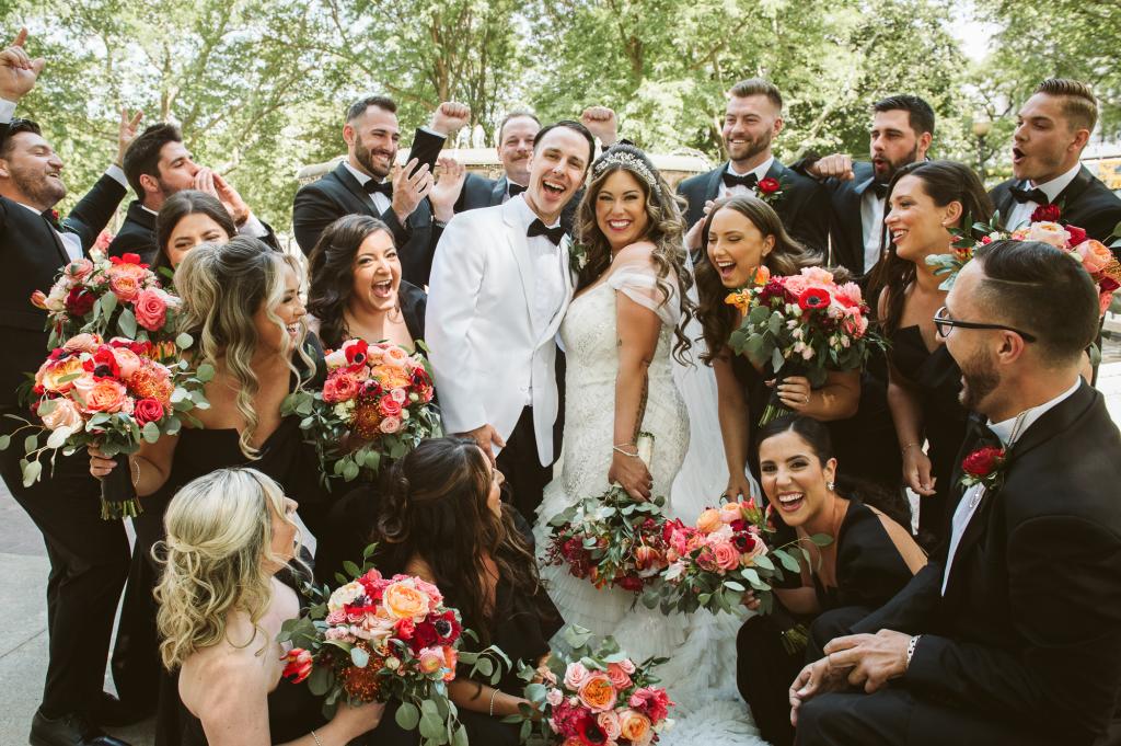 Alaina Scott and Matt Moeller at their wedding with their bridal party.