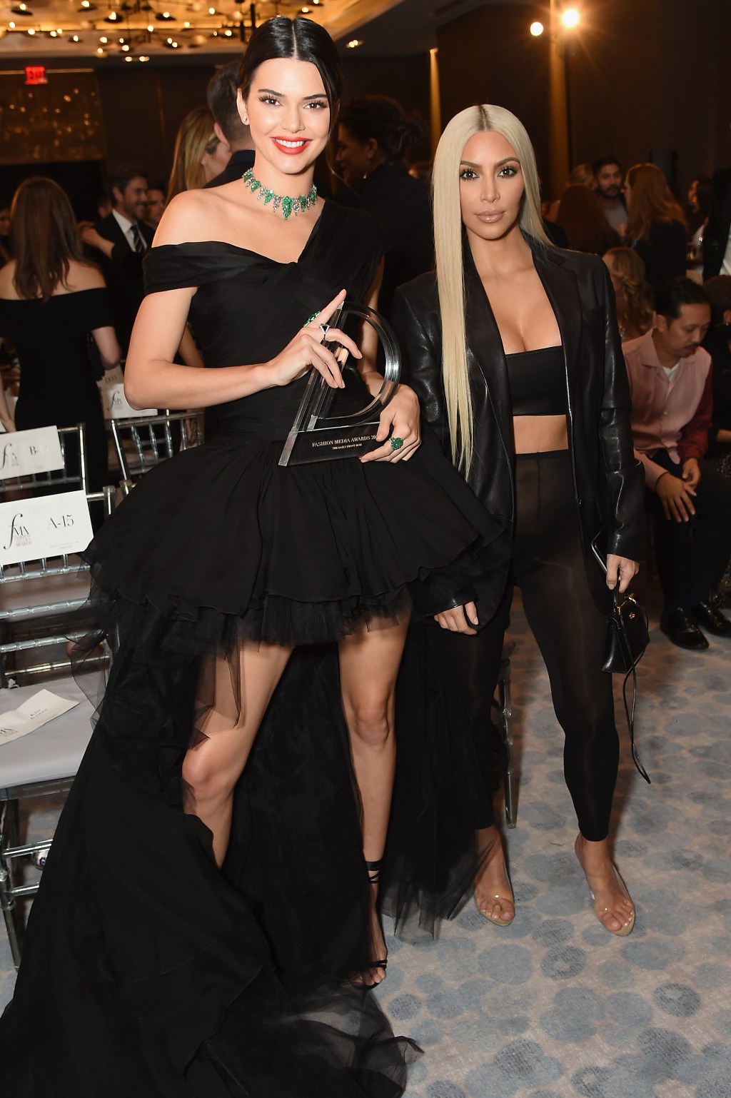 Kendall Jenner and Kim Kardashian at the Daily Front Row's Fashion Media Awards in September 2017