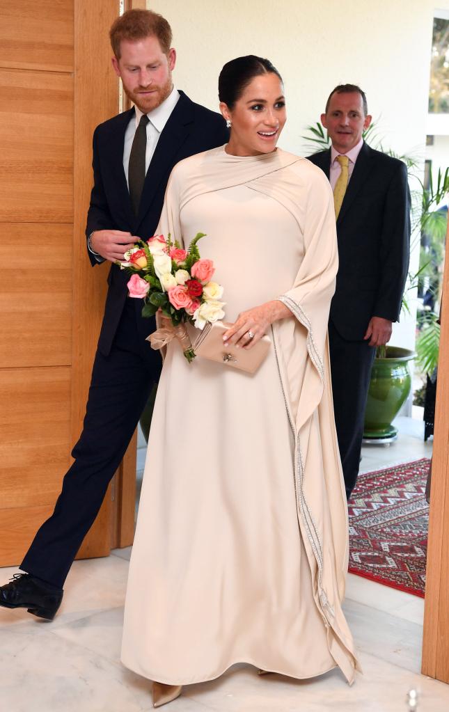 Meghan Markle wearing a draped Dior gown