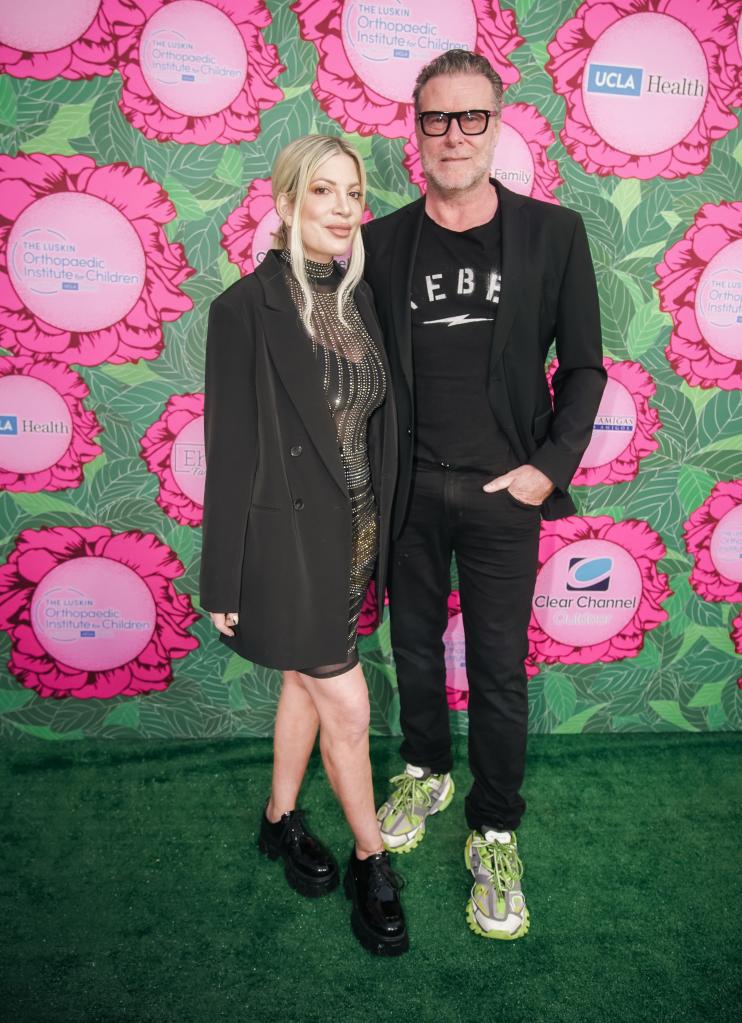 Tori Spelling and Dean McDermott attending an event together.