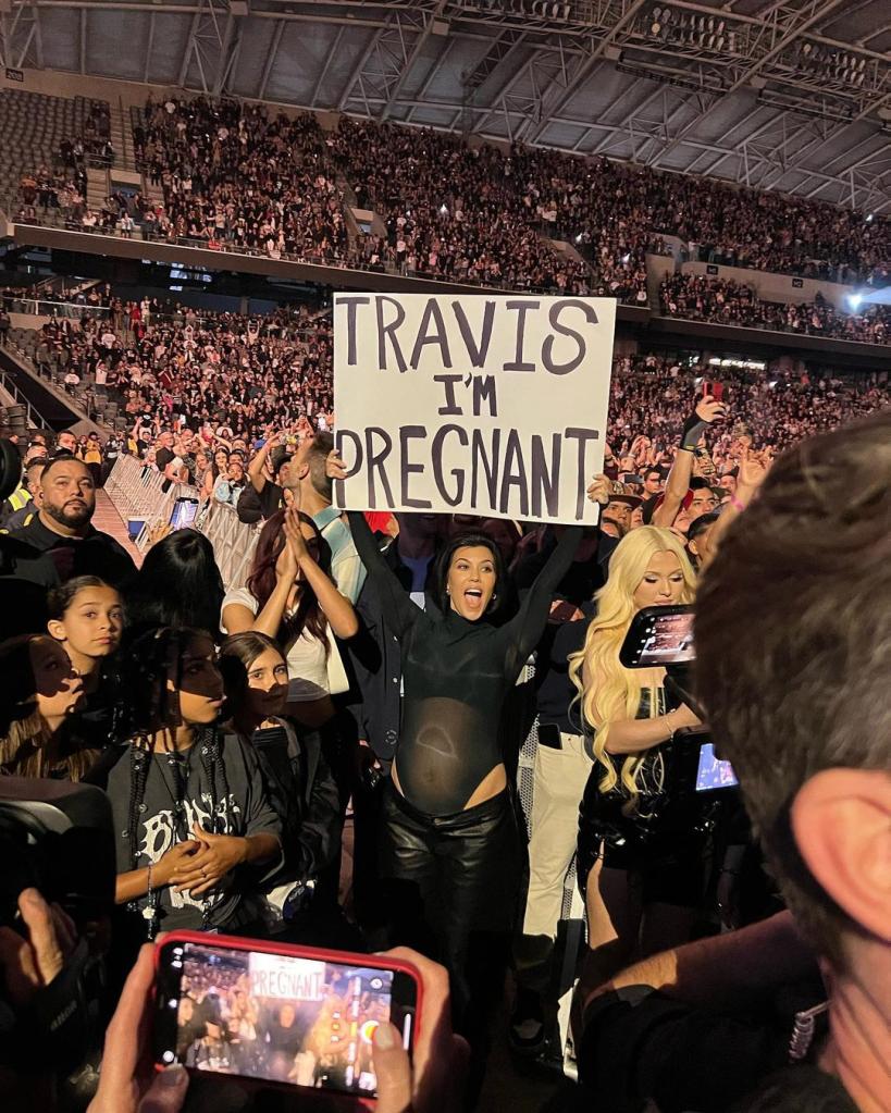 Kourtney revealed the news to Travis at a Blink-182 concert.