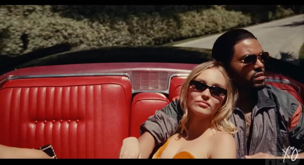 Lily Rose Depp and The Weeknd in convertible in "The Idol"