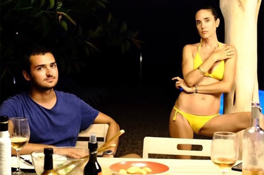 WHY SO SERIOUS? Jennifer Connelly continues her summer of fun with son Kai, 25, at an undisclosed tropical locale.