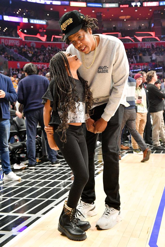 Blue Ivy and Jay-Z at a basketball game