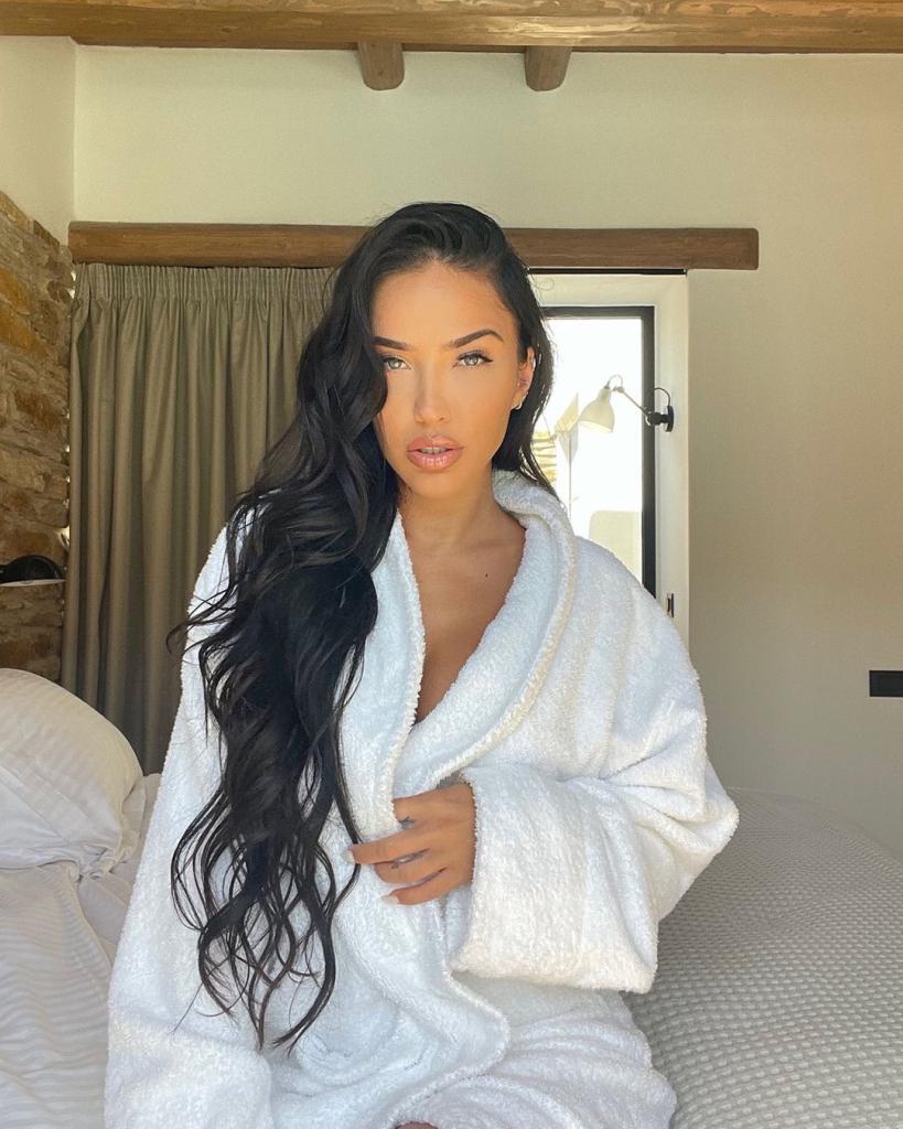 Bre Tiesi in a robe. 