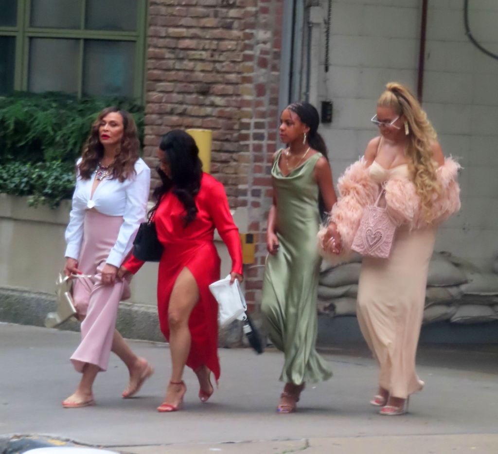 Tina Knowles walking with Beyonce and Blue Ivy