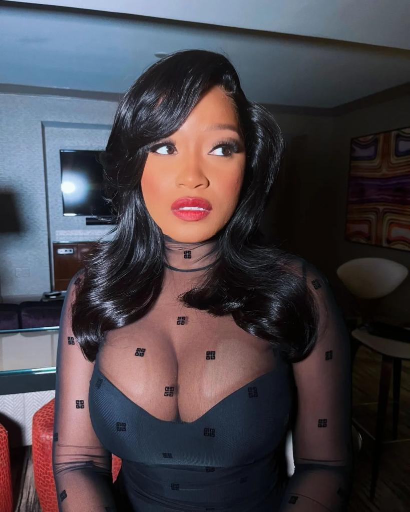 Keke Palmer in a sheer black dress.