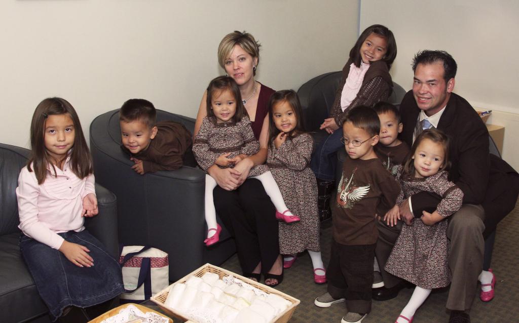 Kate Gosselin and Jon Gosselin posing with their kids when they were younger.