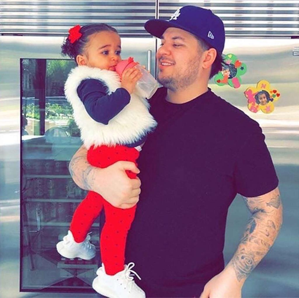 Rob Kardashian holding daughter Dream