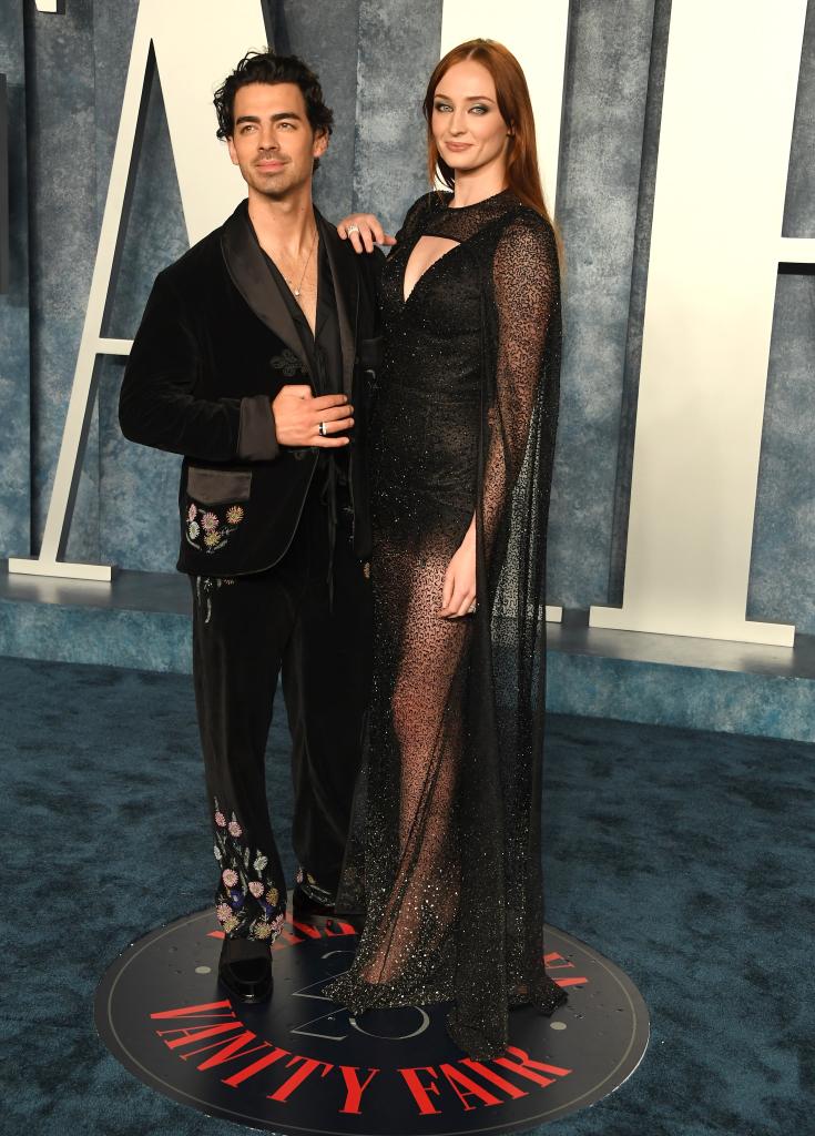 Joe Jonas and Sophie Turner on a red carpet. 