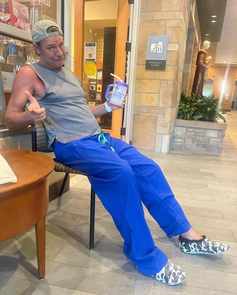 Ty Pennington sitting in a hospital chair.