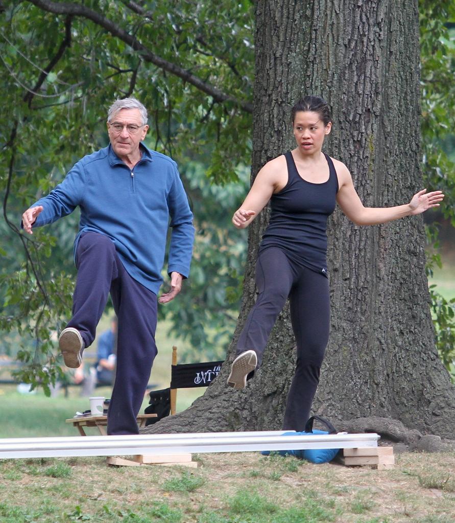 Robert De Niro and Tiffany Chen doing tai chi in "The Intern."