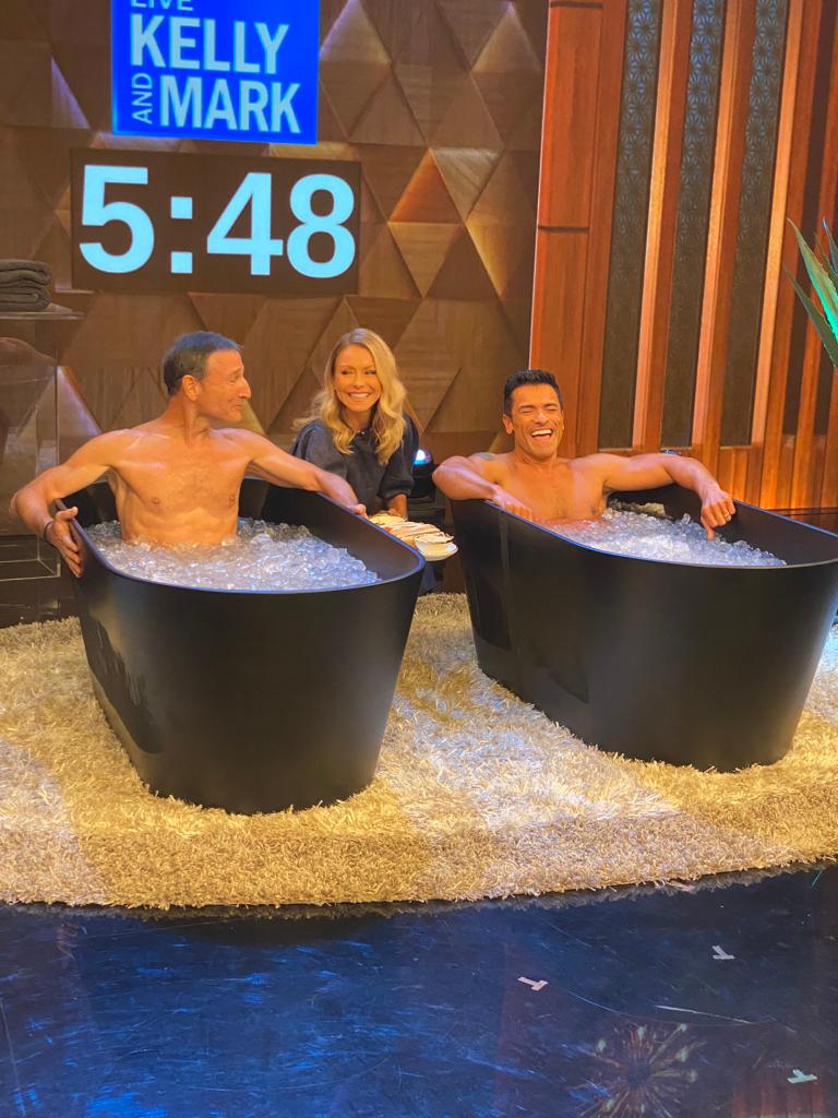 Mark Consuelos sitting in an ice tub