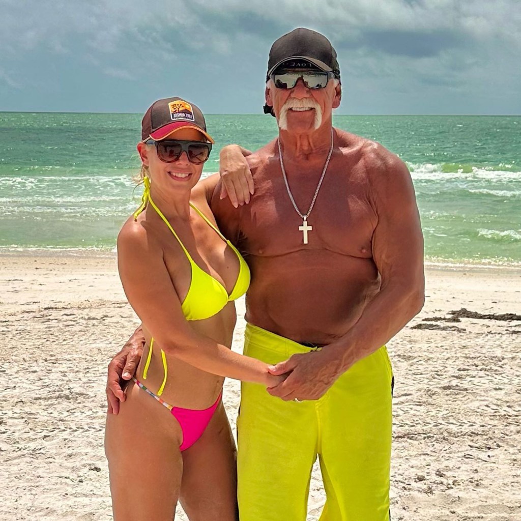 sky daily and hulk hogan on the beach in neon swimsuits