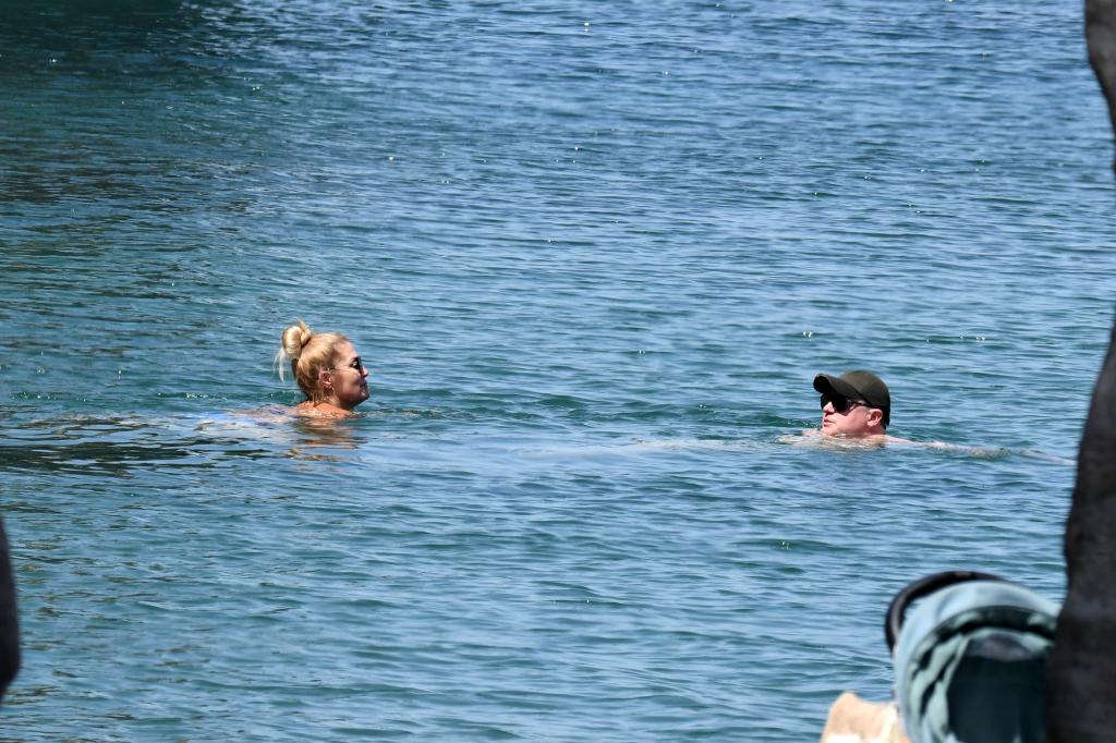 Fraser and Moore swimming in ocean