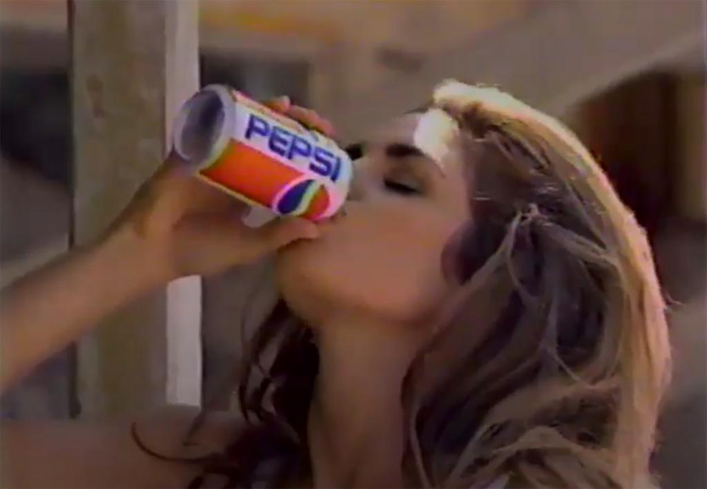 Cindy Crawford drinking a can of Pepsi in a 1992 commercial.