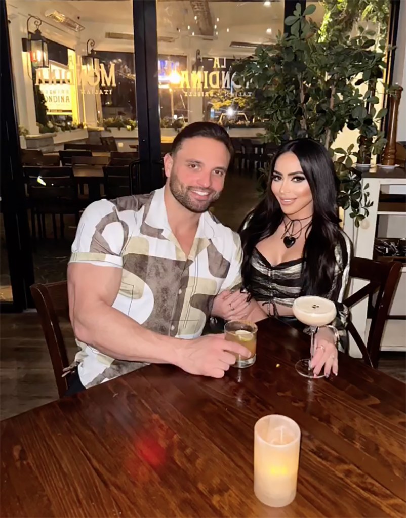 angelina pivarnick and vinny tortorella sitting at a table.