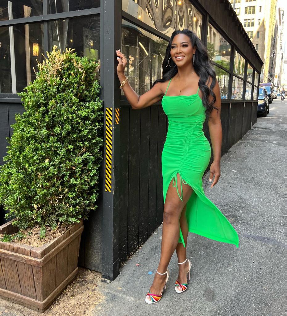 Kenya Moore in a green dress.