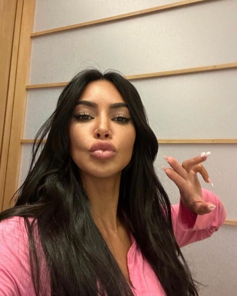 Kim Kardashian selfie in pink pajamas