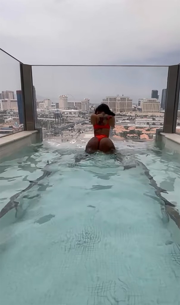 Cardi B twerking in a pool.