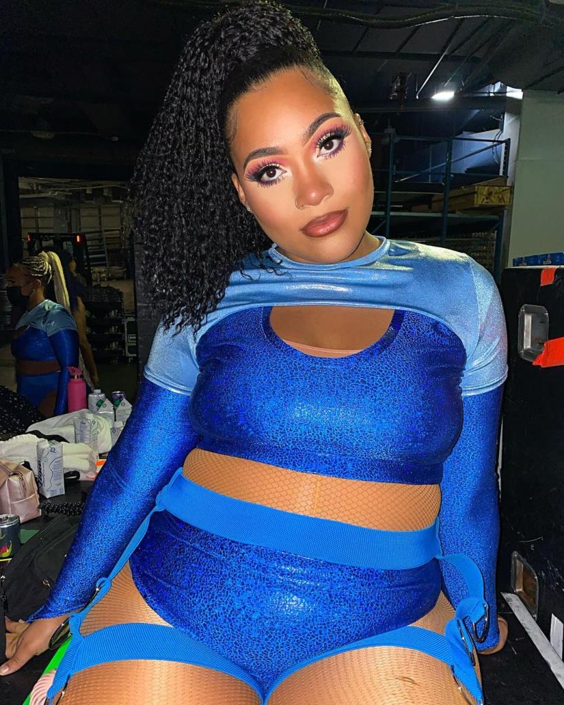 Crystal Williams in a blue dance outfit.