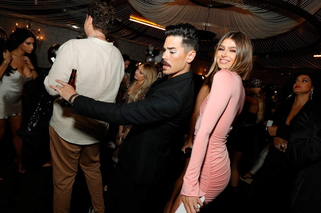 Raquel Leviss and Tom Sandoval dancing. 